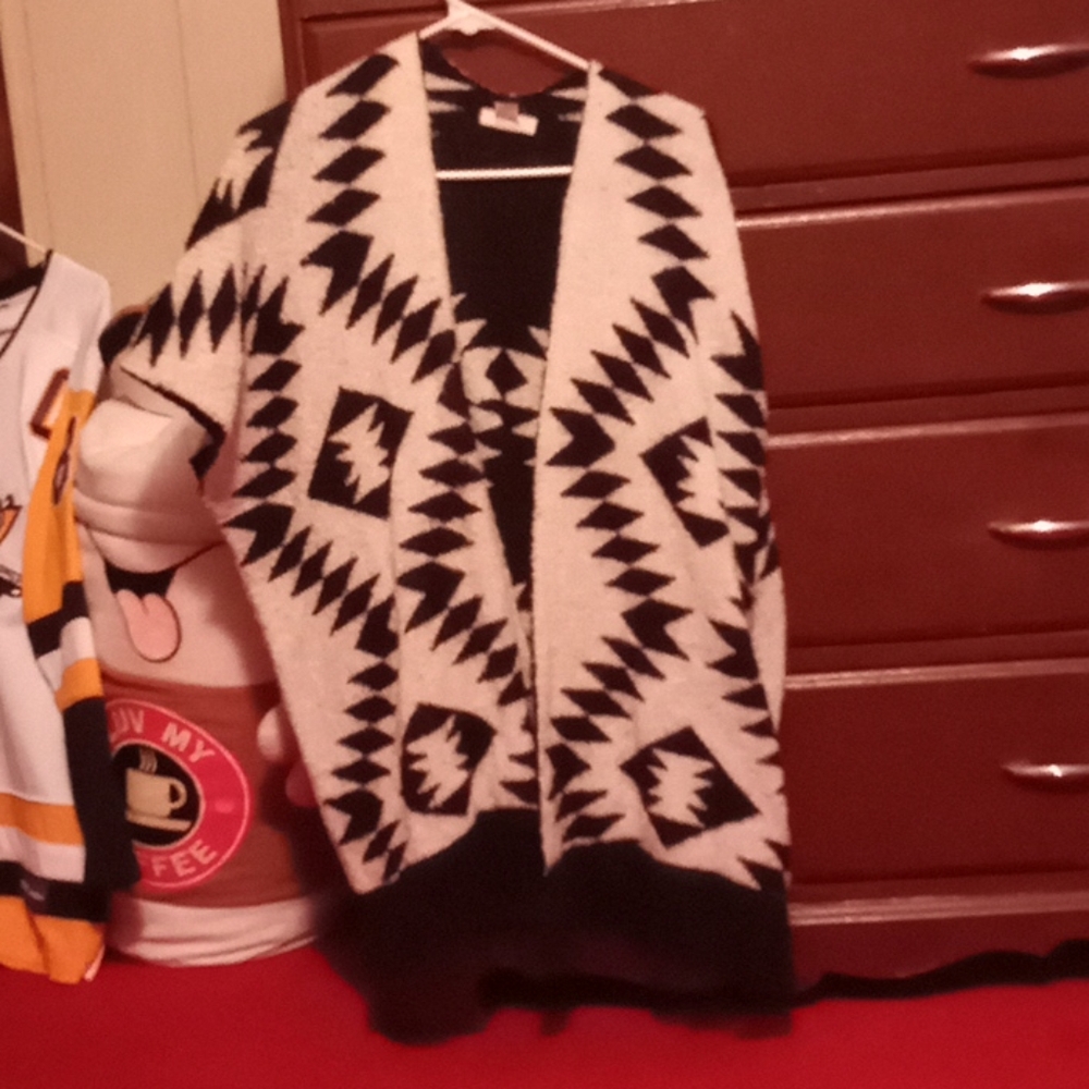 Fuzzy, patterned vest.
